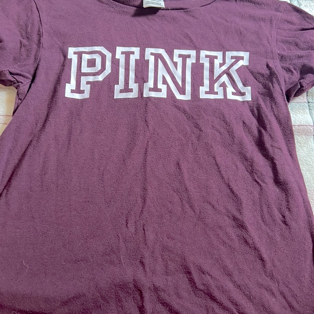 A plain dark pink/purple shirt